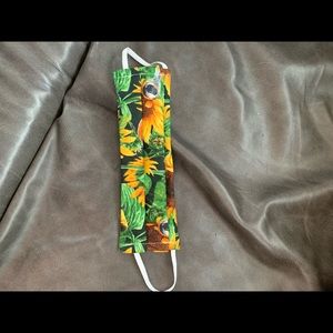 Sunflowers on green background pocket mask